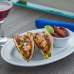 Dos Tacos Hand Helds